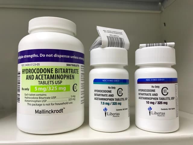 Hydrocodone pharmaceutical product bottle